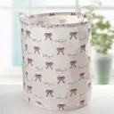 Корзина Доляна Бантики 40x4.5x44 см текстиль цвет белый 4439033