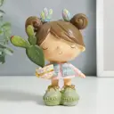 Сувенир интерьерный "Малышка с хвостиками с кактусом в горшочке" 14.8x7.5x10 см