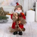 Фигура декоративная Зимнее Волшебство Дед Мороз В красной шубке с хворостом 16 см