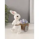 Сувенир полистоун Зайчик с тележкой фиолетовых тюльпанов 115х55х12 см 10583234