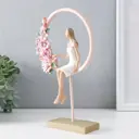 Сувенир полистоун Девушка сидит в розовом кольце с цветами 16х6х255 см 9837994