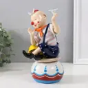 Сувенир керамика музыкальный Клоун с бабочкой и цветком сидит на чашке 95х10х18 см 9768485