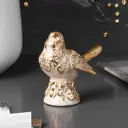 Статуэтка из мрамора Bogacho Птичка Терра кремового цвета