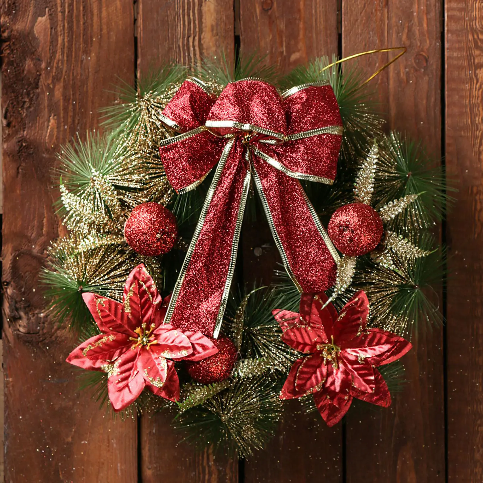 Изображение товара Рождественский венок Зимнее волшебство 3557047 ø 28 см с декором Бантик с красными цветами