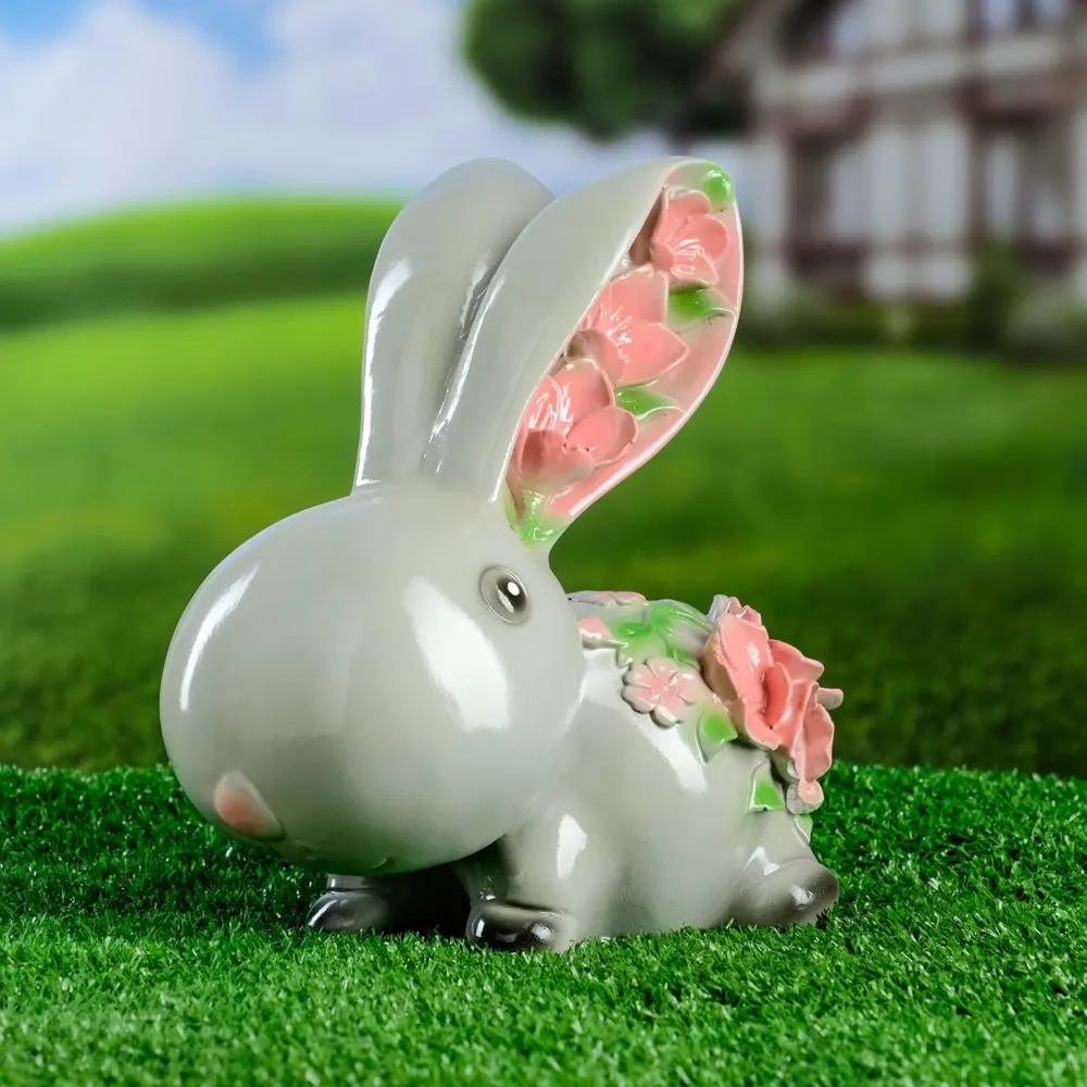 Фото Садовая фигура Хорошие сувениры Зайка с цветами серая 20x20x10см Фото Садовая фигура Хорошие сувениры Зайка с цветами серая 20x20x10см