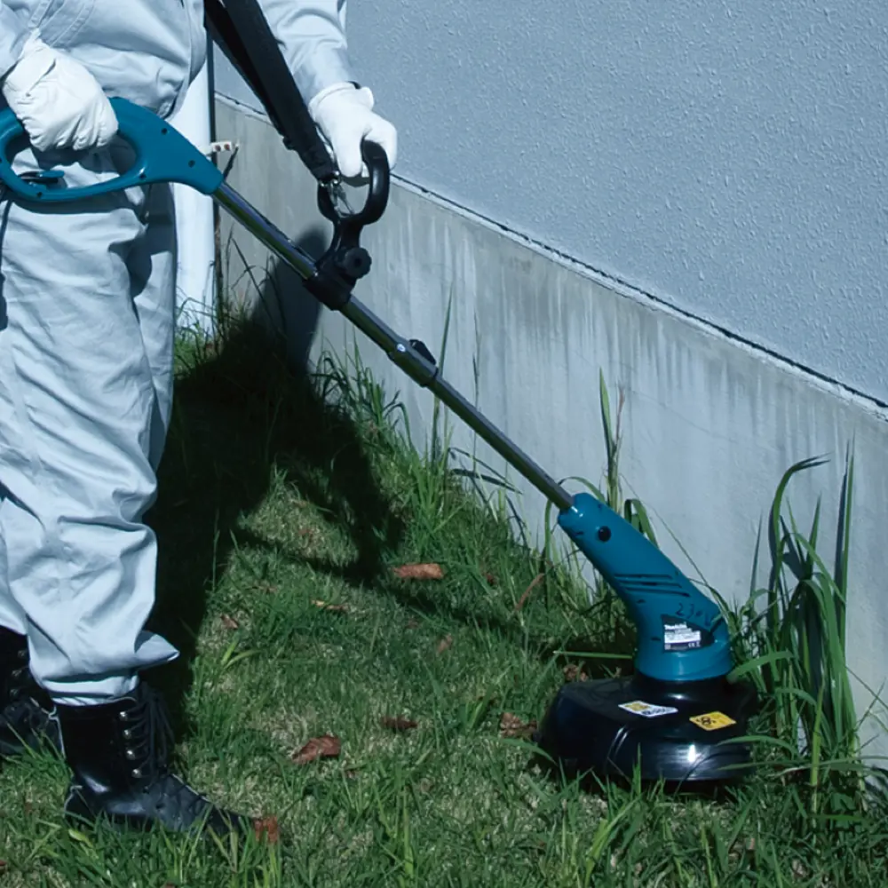 Trimmer electric makita discount