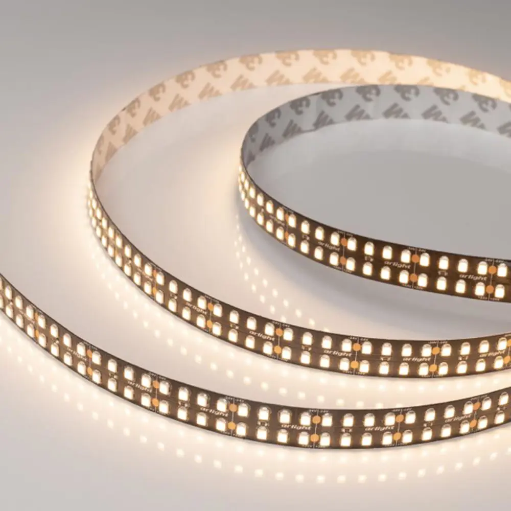 Фото Светодиодная лента ARLIGHT 032609 SMD 2835 320 диод/22 Вт/м 24 В IP20 50 м теплый белый свет Фото Светодиодная лента ARLIGHT 032609 SMD 2835 320 диод/22 Вт/м 24 В IP20 50 м теплый белый свет