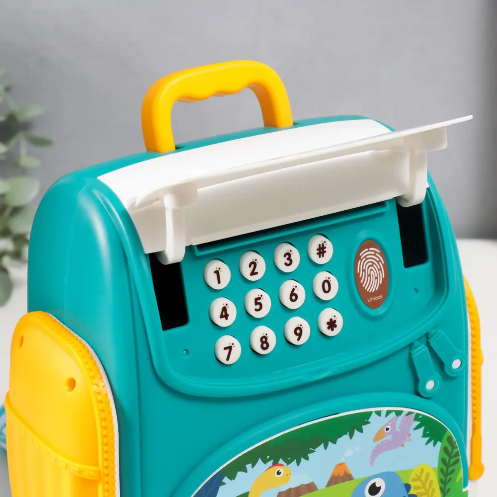 Фото 6 Копилка "Рюкзак с динозаврами" со звуком, 3 батарейки АА, 18x10x19.8 см