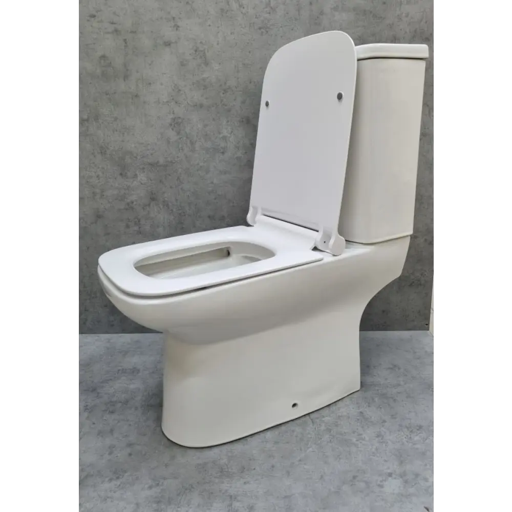 Фото 3 Унитаз-компакт Ceramalux WK-9125 горизонтальный выпуск двойной слив Фото 3 Унитаз-компакт Ceramalux WK-9125 горизонтальный выпуск двойной слив