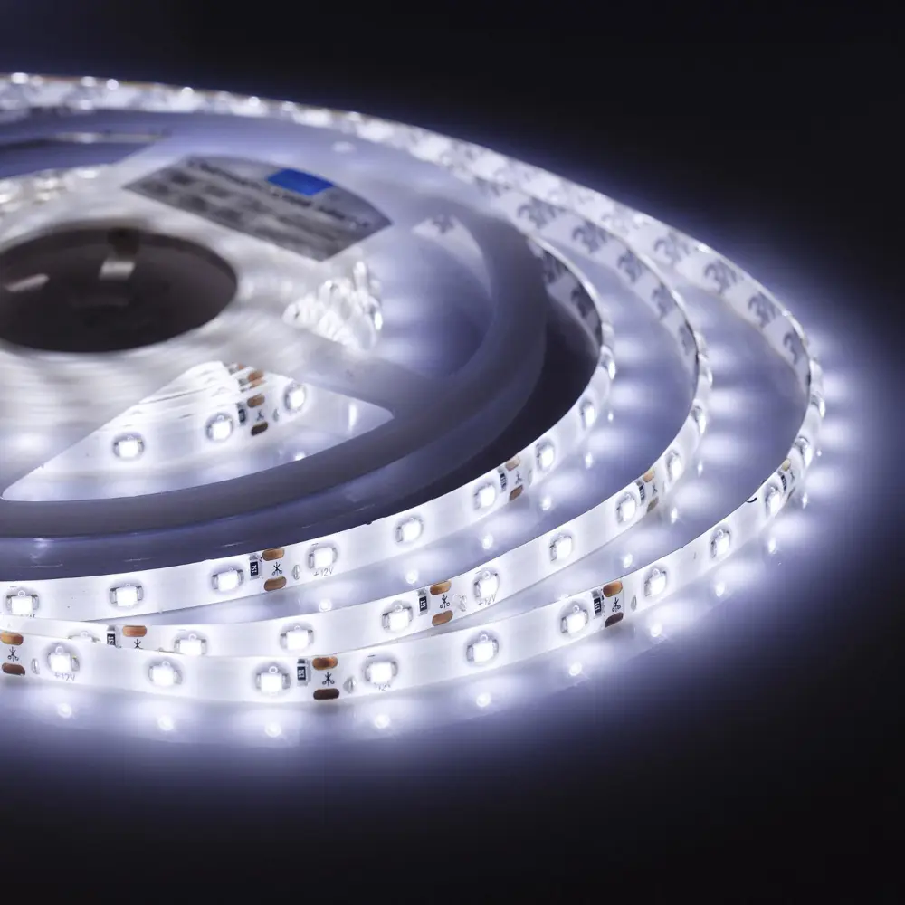 Фото Светодиодная лента APEYRON ELECTRICS 7328378 SMD 3528 60диод/м 12 В IP65 5 м холодный белый свет Фото Светодиодная лента APEYRON ELECTRICS 7328378 SMD 3528 60диод/м 12 В IP65 5 м холодный белый свет