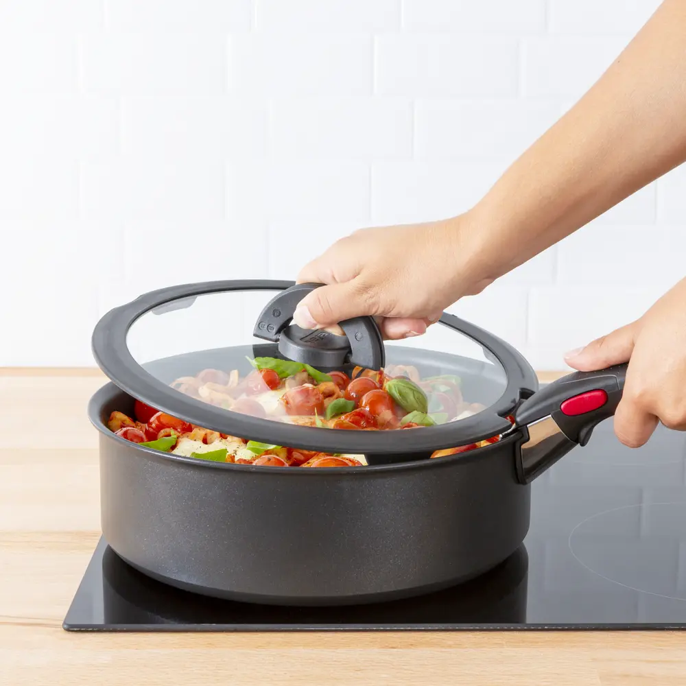 Фото 4 Крышка кухонная Tefal L9846653 26 см стекло цвет черный, прозрачный Фото 4 Крышка кухонная Tefal L9846653 26 см стекло цвет черный, прозрачный