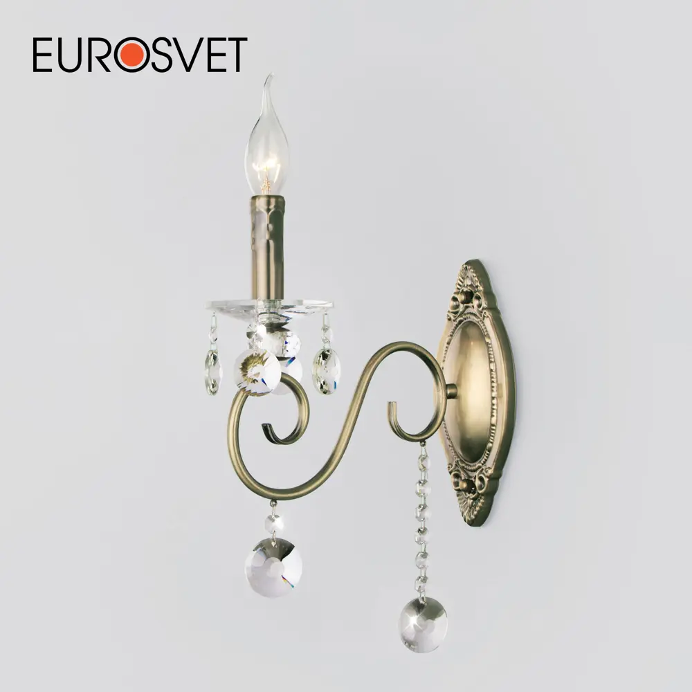 Фото Бра Eurosvet Ravenna 10104/1 античная бронза/прозрачный хрусталь Strotskis E14 Фото Бра Eurosvet Ravenna 10104/1 античная бронза/прозрачный хрусталь Strotskis E14
