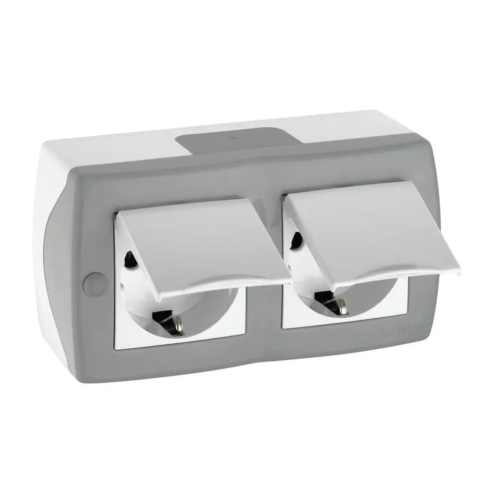 Фото Розетка двойная накладная Mono electric Octans 104-020001-184 с заземлением и крышкой цвет серый Фото Розетка двойная накладная Mono electric Octans 104-020001-184 с заземлением и крышкой цвет серый