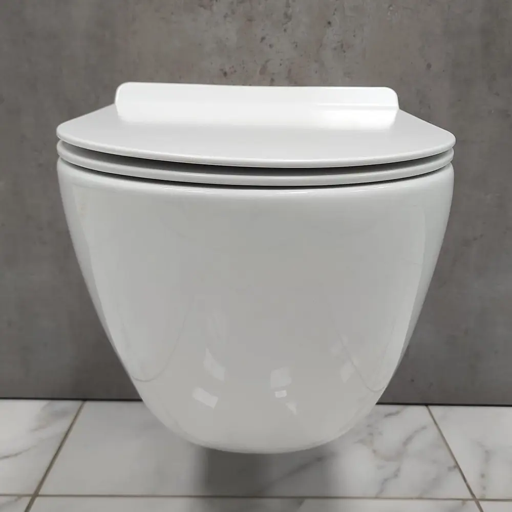 Фото 3 Унитаз подвесной Bloomix Fresh 5002SB безободковый с сиденьем микролифт Фото 3 Унитаз подвесной Bloomix Fresh 5002SB безободковый с сиденьем микролифт