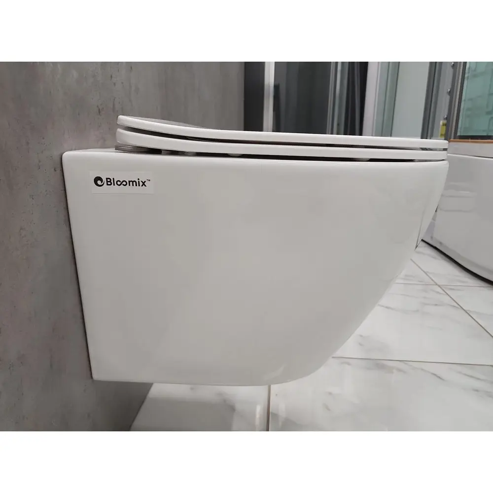 Фото 5 Унитаз подвесной Bloomix Trend 1203 безободковый с сиденьем микролифт Фото 5 Унитаз подвесной Bloomix Trend 1203 безободковый с сиденьем микролифт