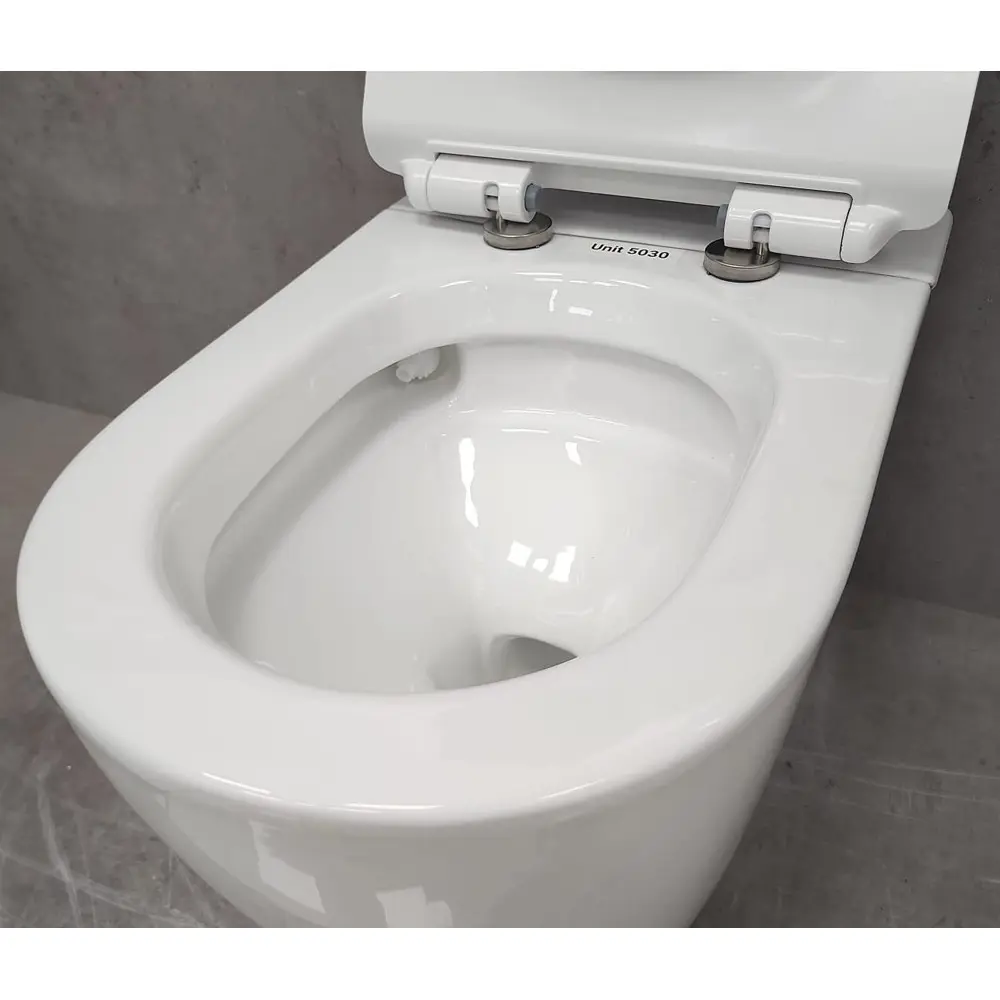Фото 7 Унитаз подвесной Bloomix Unit 5030 безободковый с сиденьем микролифт Фото 7 Унитаз подвесной Bloomix Unit 5030 безободковый с сиденьем микролифт