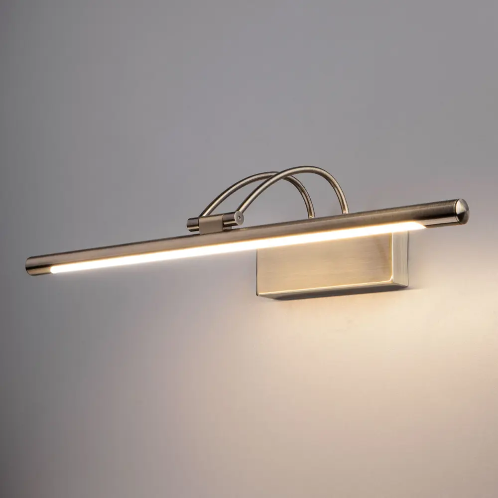 Фото 3 Подсветка для картин светодиодная Elektrostandard Mrl led 10w 1011 ip20 теплый белый (желтый) свет цвет бронза Фото 3 Подсветка для картин светодиодная Elektrostandard Mrl led 10w 1011 ip20 теплый белый (желтый) свет цвет бронза