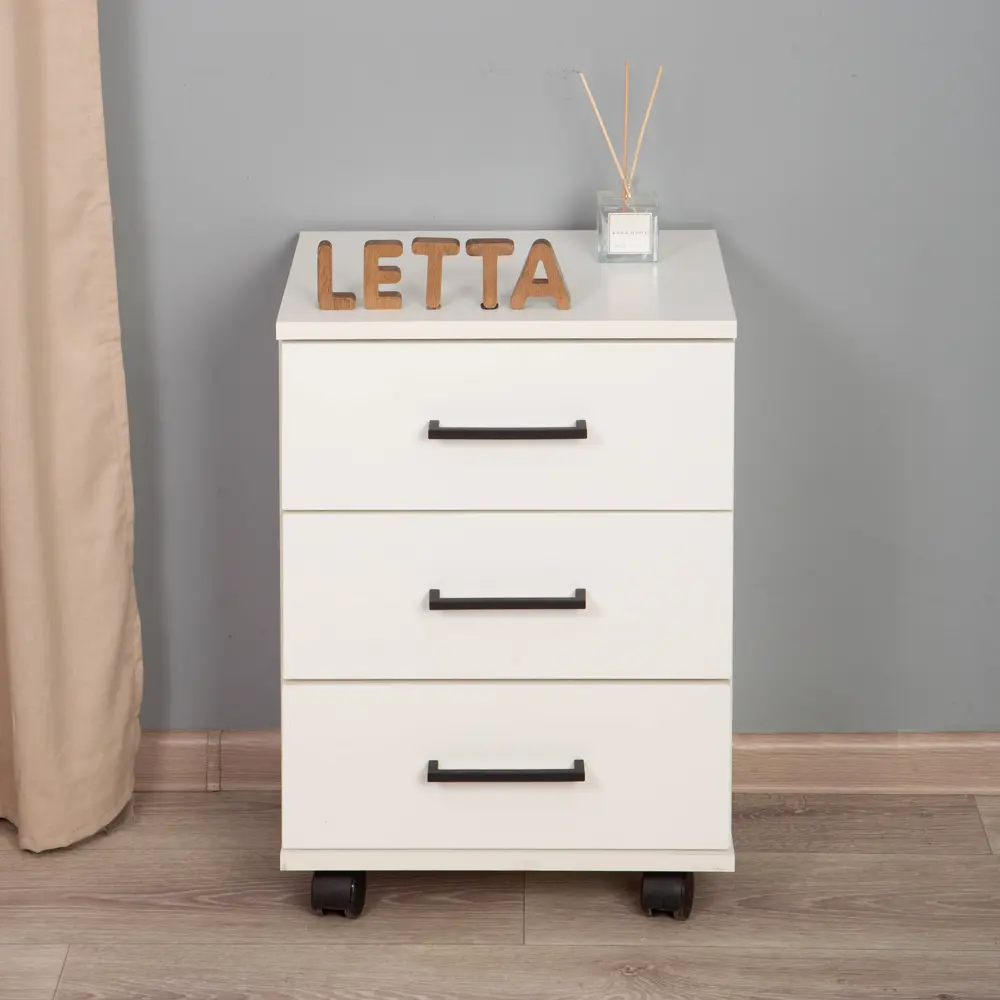 Фото 2 Тумба прикроватная Letta на колесах 40x57.6x33.4 см 3 ящика ЛДСП цвет белый Фото 2 Тумба прикроватная Letta на колесах 40x57.6x33.4 см 3 ящика ЛДСП цвет белый