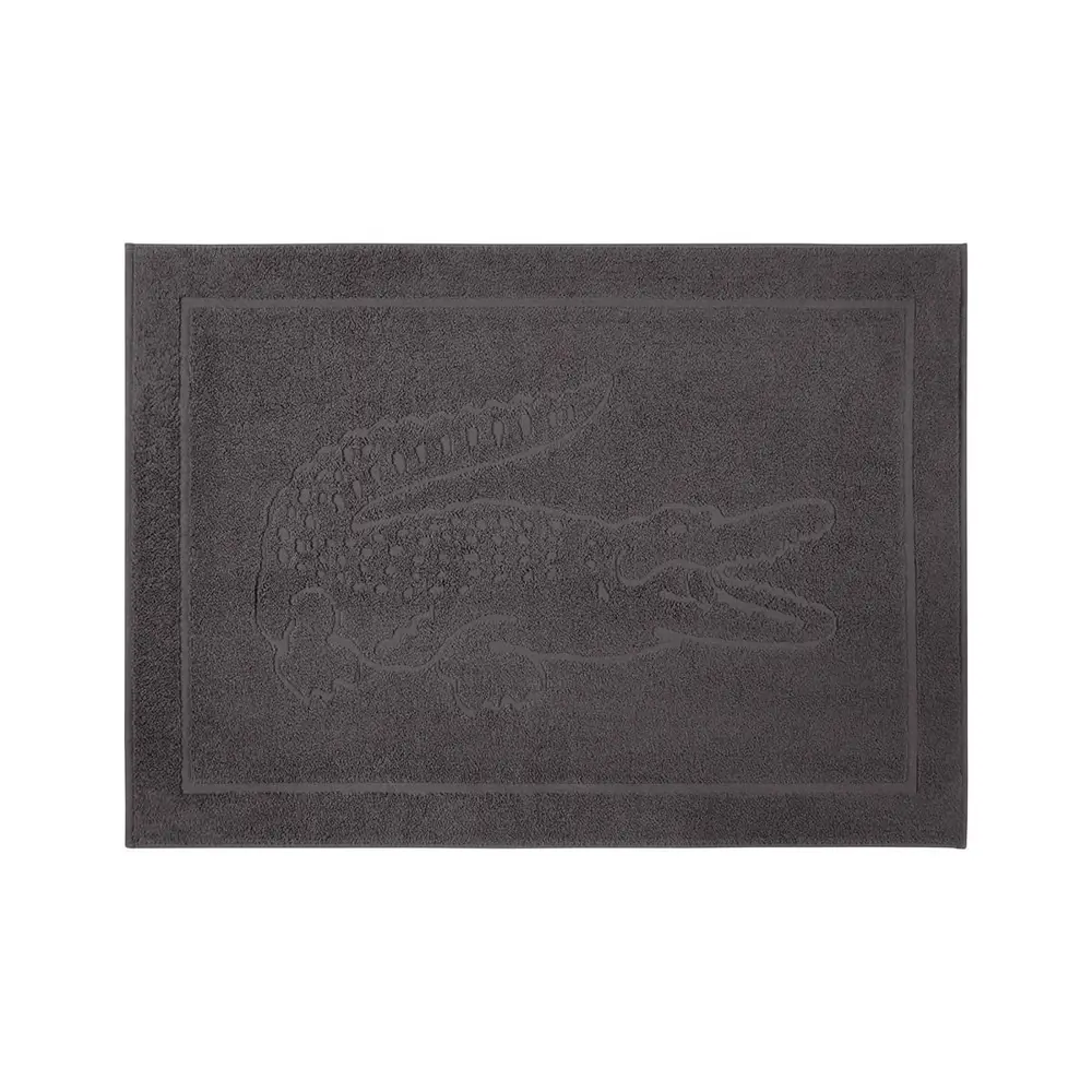 Фото Коврик для ванной комнаты Lacoste Bitume 80x55 см цвет серый/серебристый Фото Коврик для ванной комнаты Lacoste Bitume 80x55 см цвет серый/серебристый