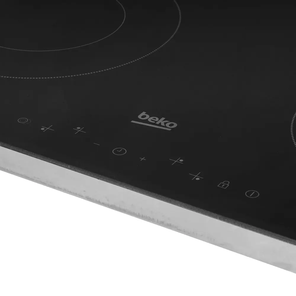 Фото 5 Электрическая варочная панель Beko HIC 64403 T 58 см 4 конфорки цвет черный премиум Фото 5 Электрическая варочная панель Beko HIC 64403 T 58 см 4 конфорки цвет черный премиум