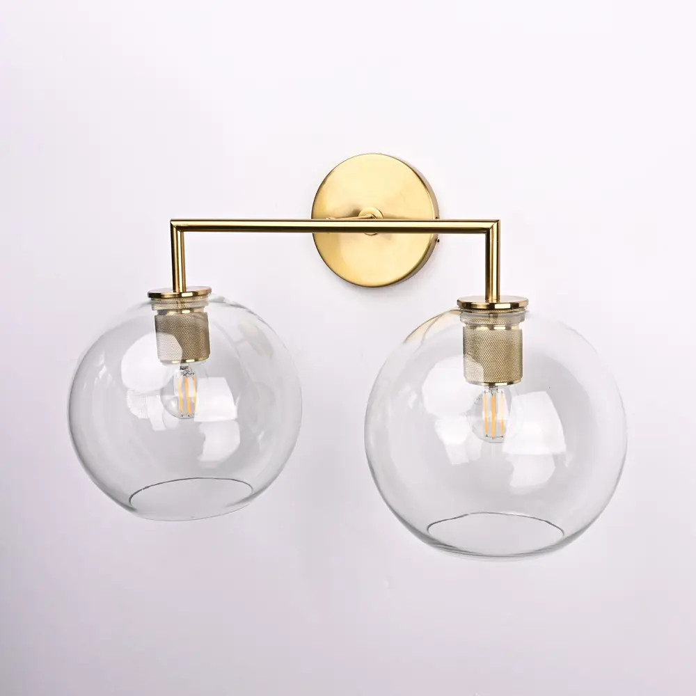 Фото 3 Настенный светильник Imperiumloft Rh globe shade double sconce brass Impr_123273-22 цвет прозрачный/латунь Фото 3 Настенный светильник Imperiumloft Rh globe shade double sconce brass Impr_123273-22 цвет прозрачный/латунь
