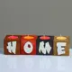 Подсвечник Simaland для интерьера 4 шт с надписью Home, цвет: "Микс" аромат: ягодно-фруктовый Микс