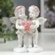 Фигурка "Ангелочки в розовых веночках с сердцем из роз" 10x8.5x5.5 см