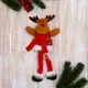 Елочная игрушка Олень в костюмчике с орнаментом длинные ножки Зимнее волшебство 9692640 24 см х 24 см красный