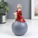 Фигурка сувенирная Simaland Девушка в бордовом платье на шаре 17.5x10x10 см