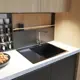 Мойка настольного монтажа 60х50 (3.0) правая. вып 3 1/2 TROPFBERG 20см с сифоном (черный графит)