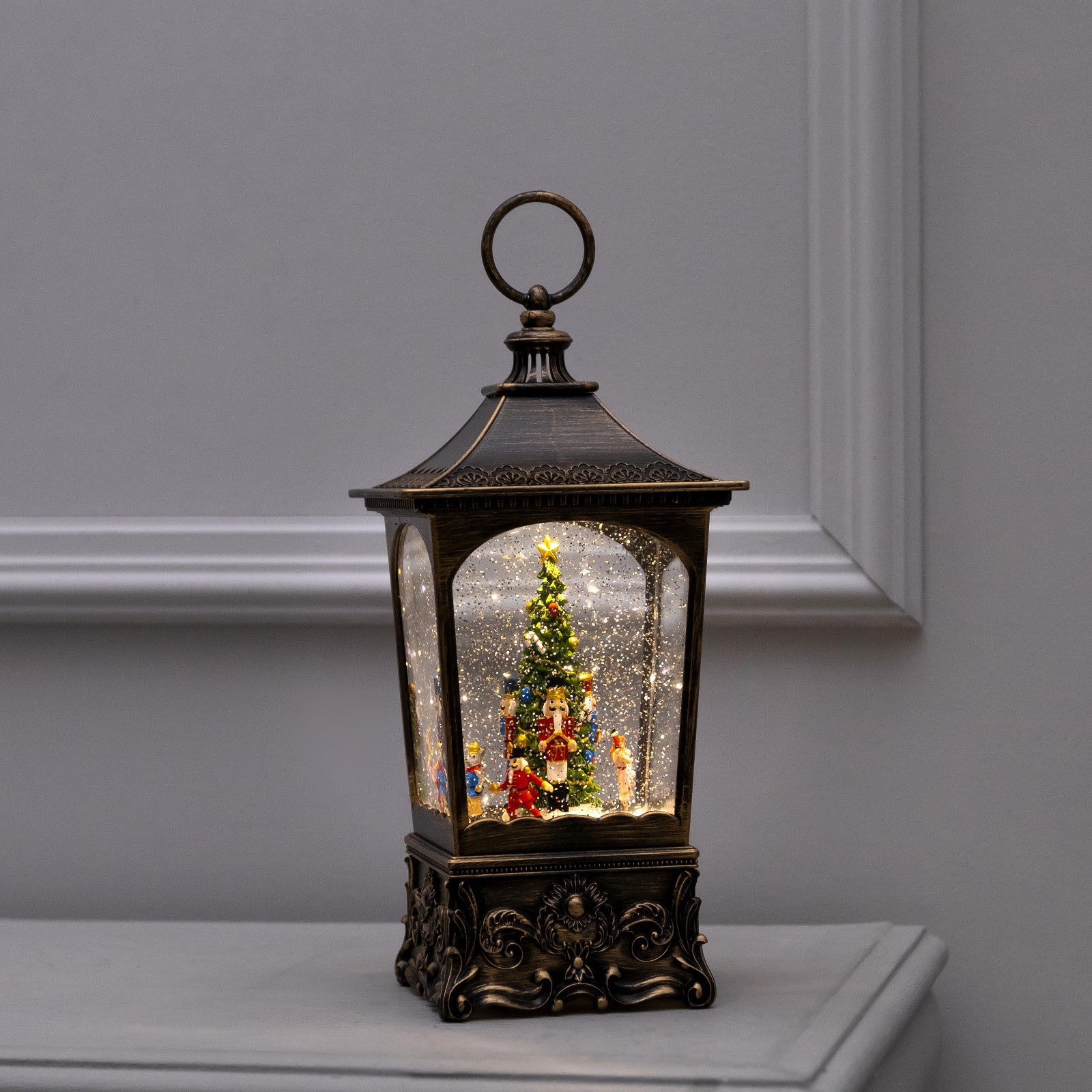 Изображение товара Светящаяся электрическая фигура в виде фонаря с щелкунчиком 28.5 см тепло белое светодиодное