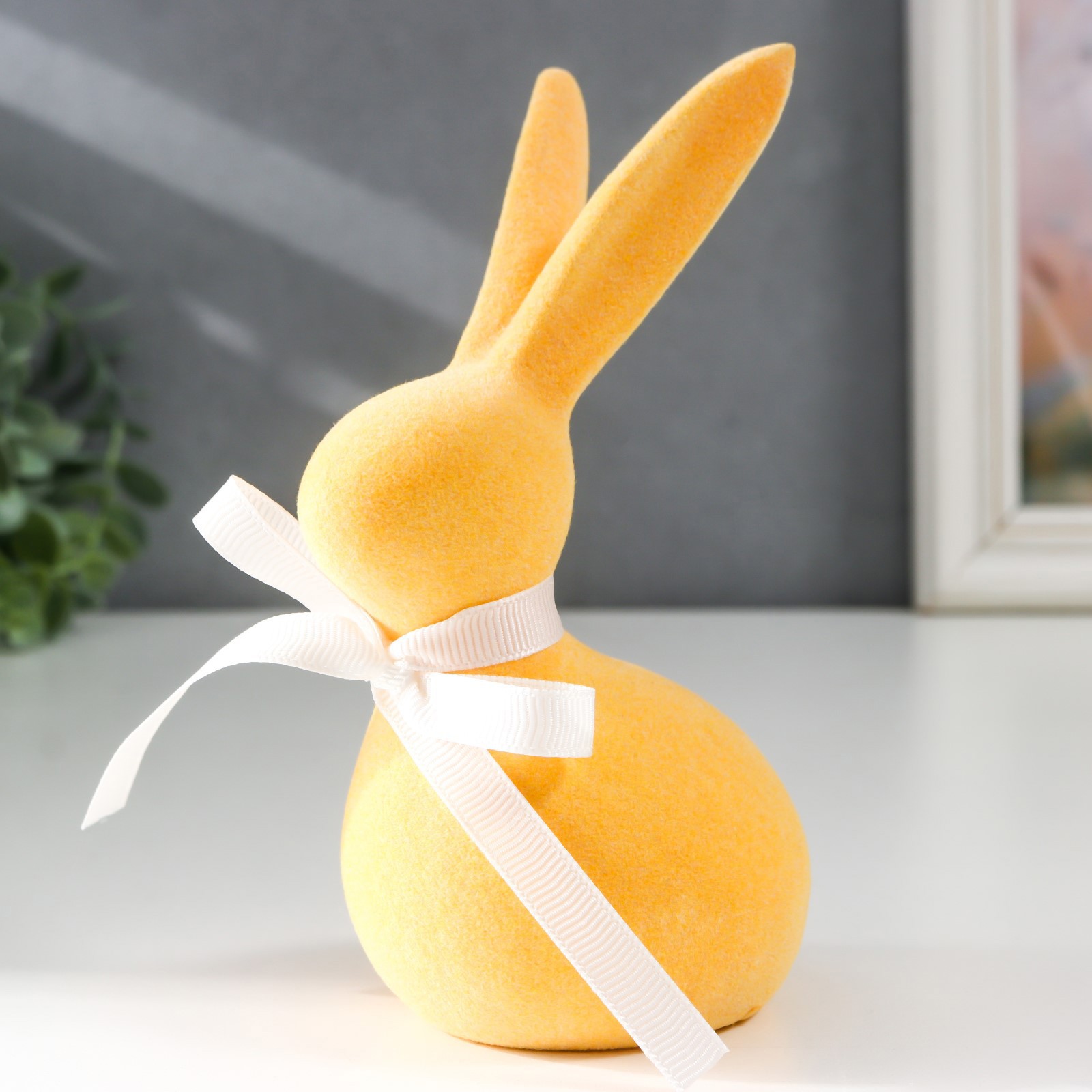 Изображение товара Фигурка "Солнечный зайчик с бантиком" жёлтый флок 14.6x6.7x9.5 см