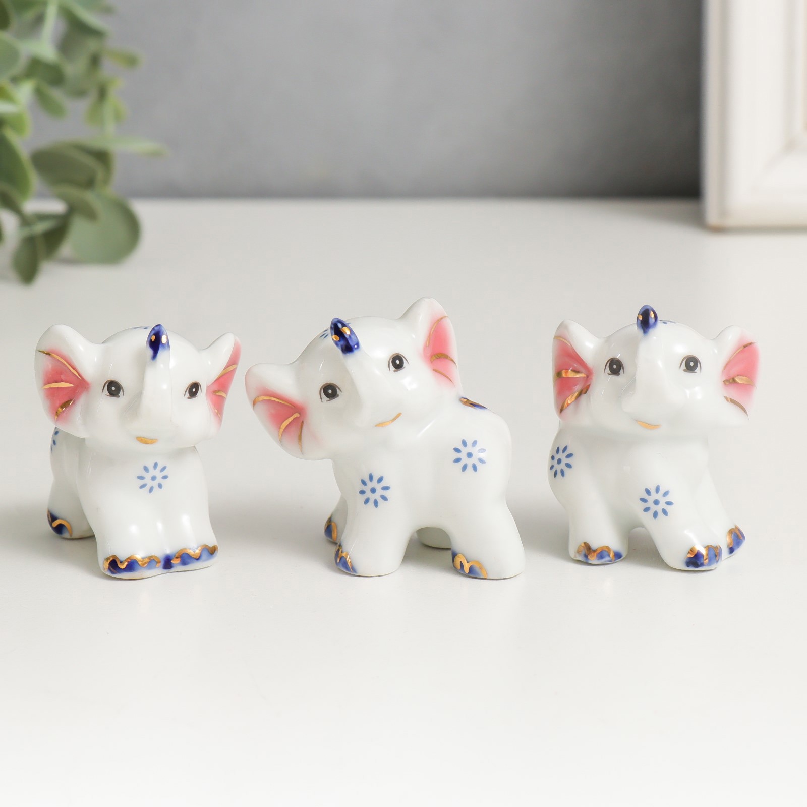 Изображение товара Набор фигурок 3 шт "Три слонёнка с цветочками" 4x3.5x3 см