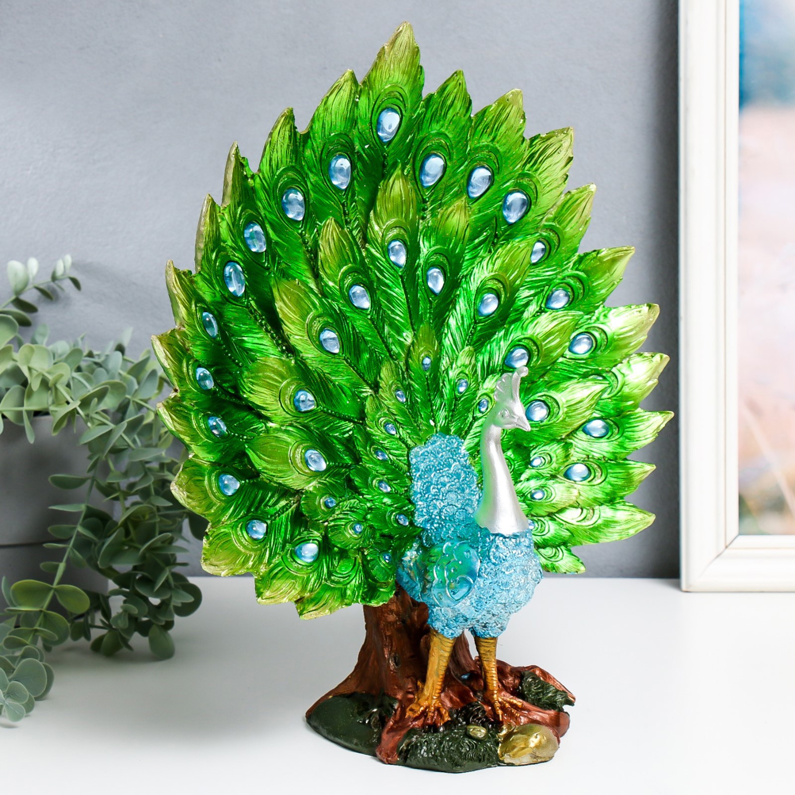 Изображение товара Синий павлин на лугу – декоративная фигура 13x30x35 см