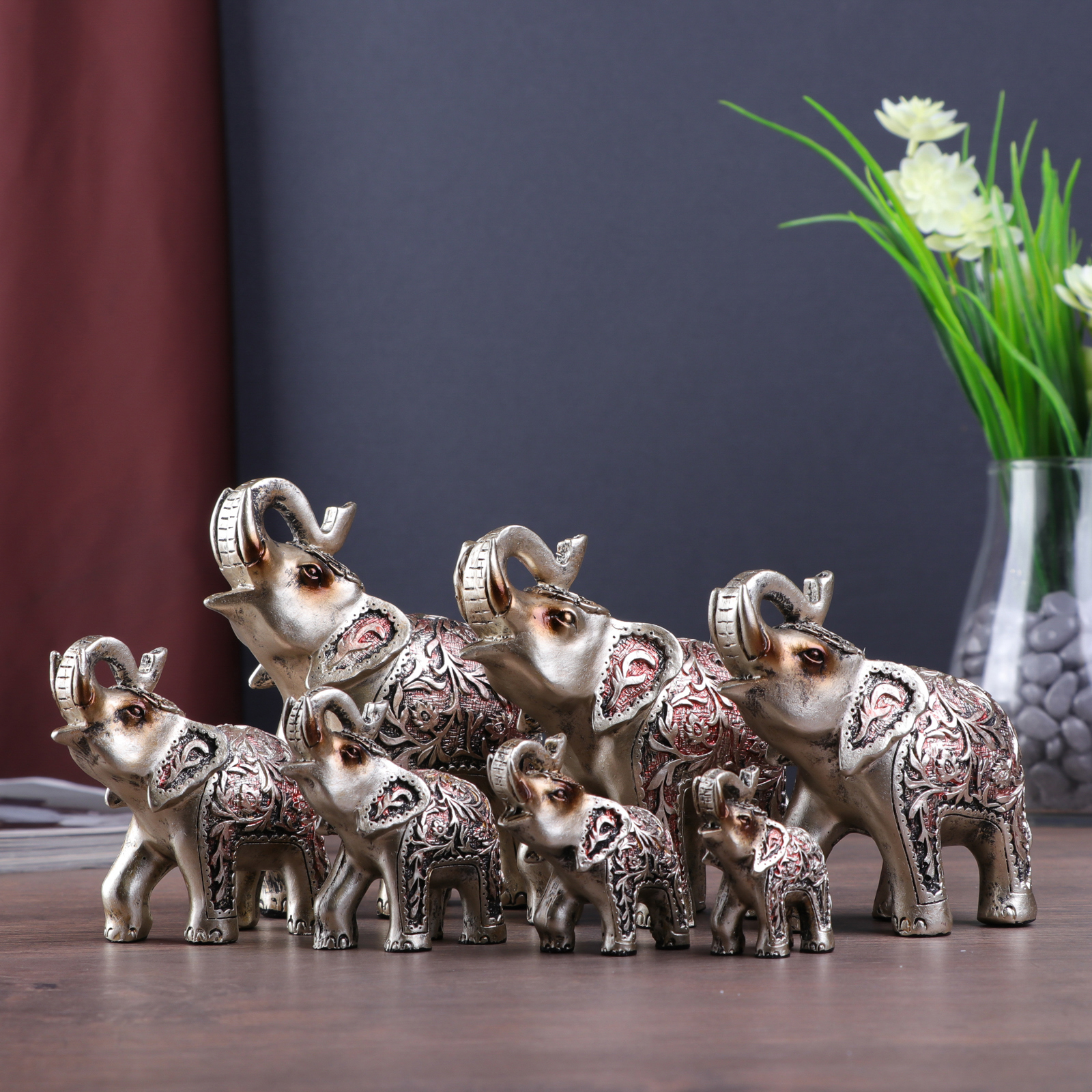 Изображение товара Сувенир интерьерный "Слоны, попона в листьях" набор 7 шт h=5;5.8;7;8.5;10;11;13 см