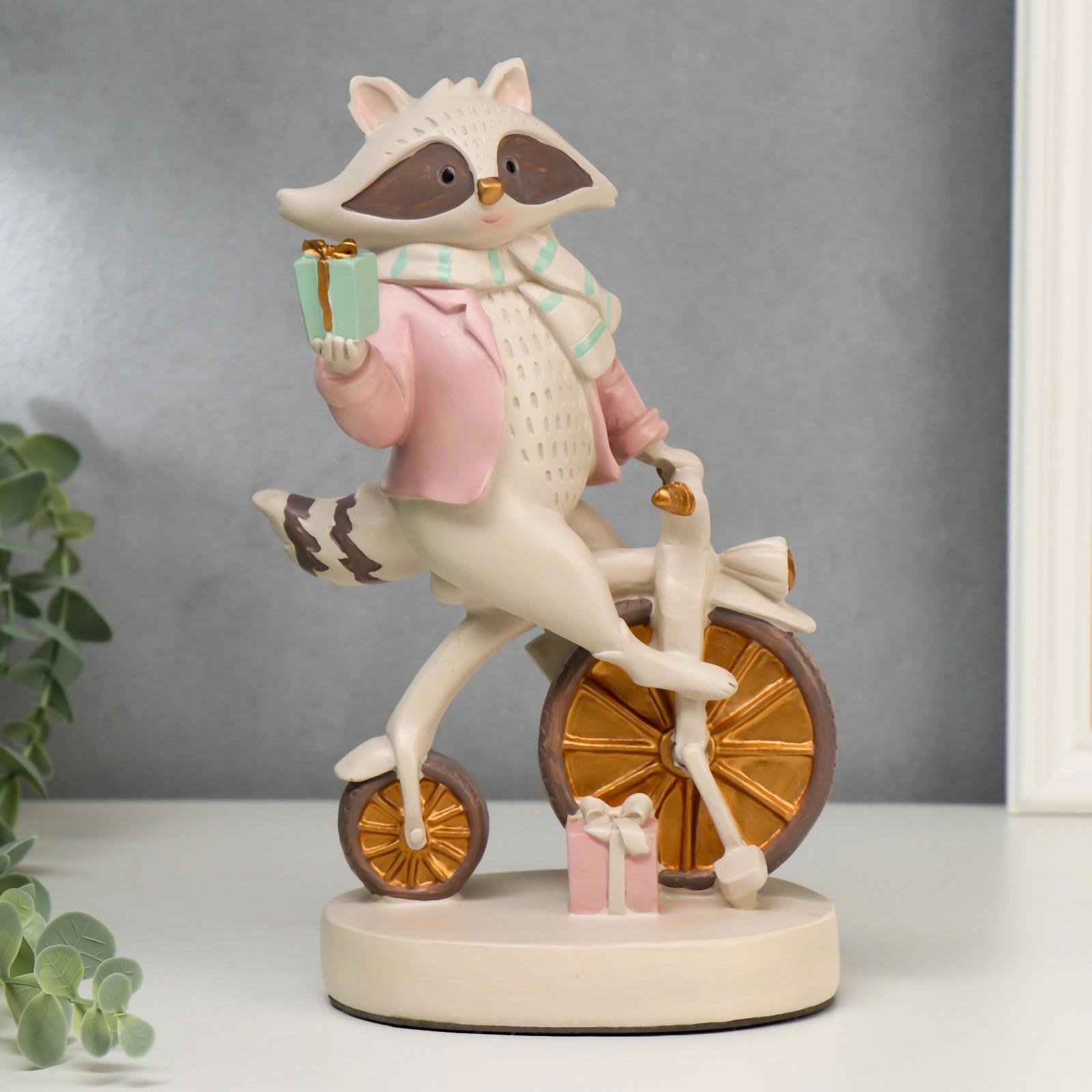 Изображение товара Декоративная фигура SIMALAND Енотик на велосипеде 24x15,5x9,7 см