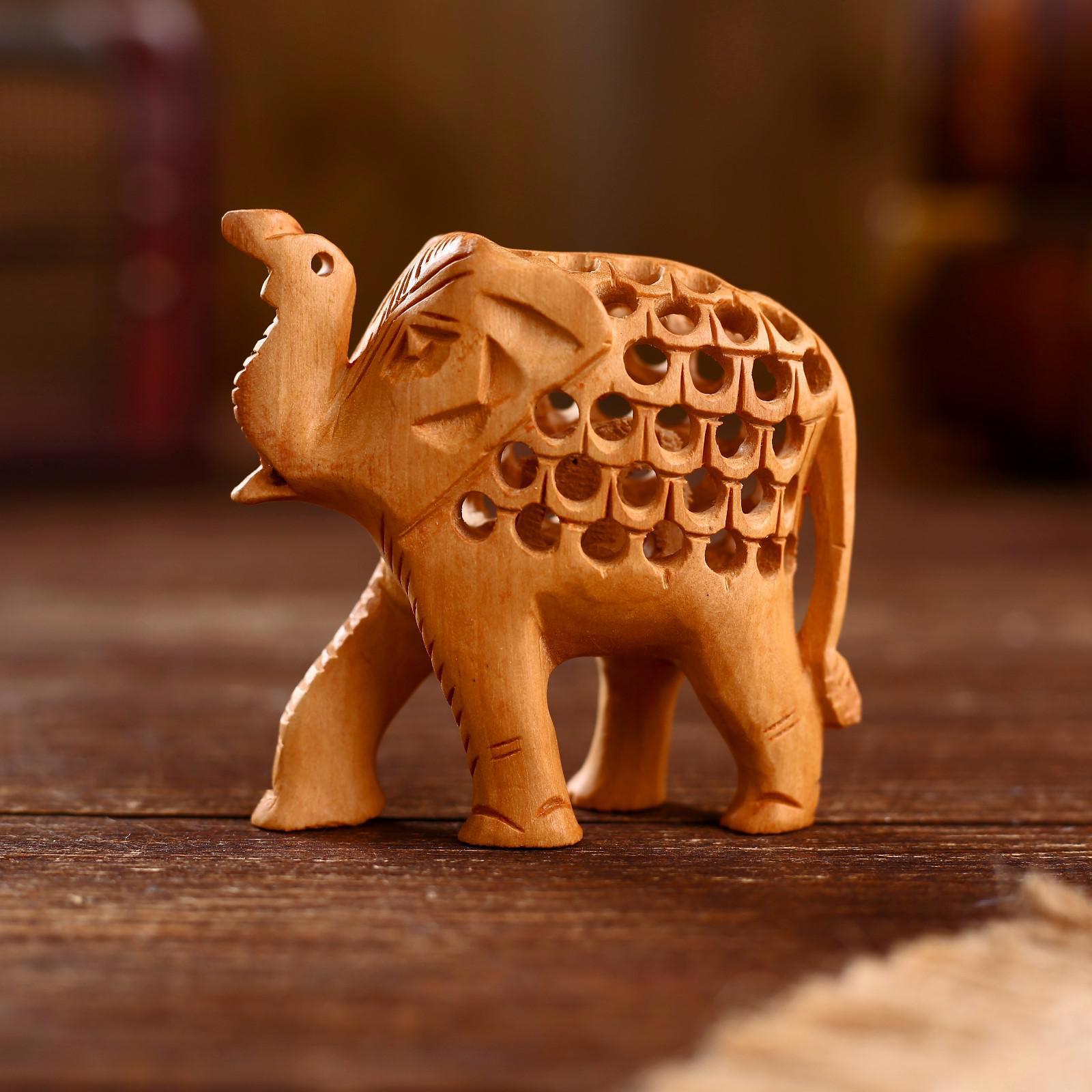 Изображение товара Слон резной 7,5×3,5×8 см — декоративная фигура из дерева