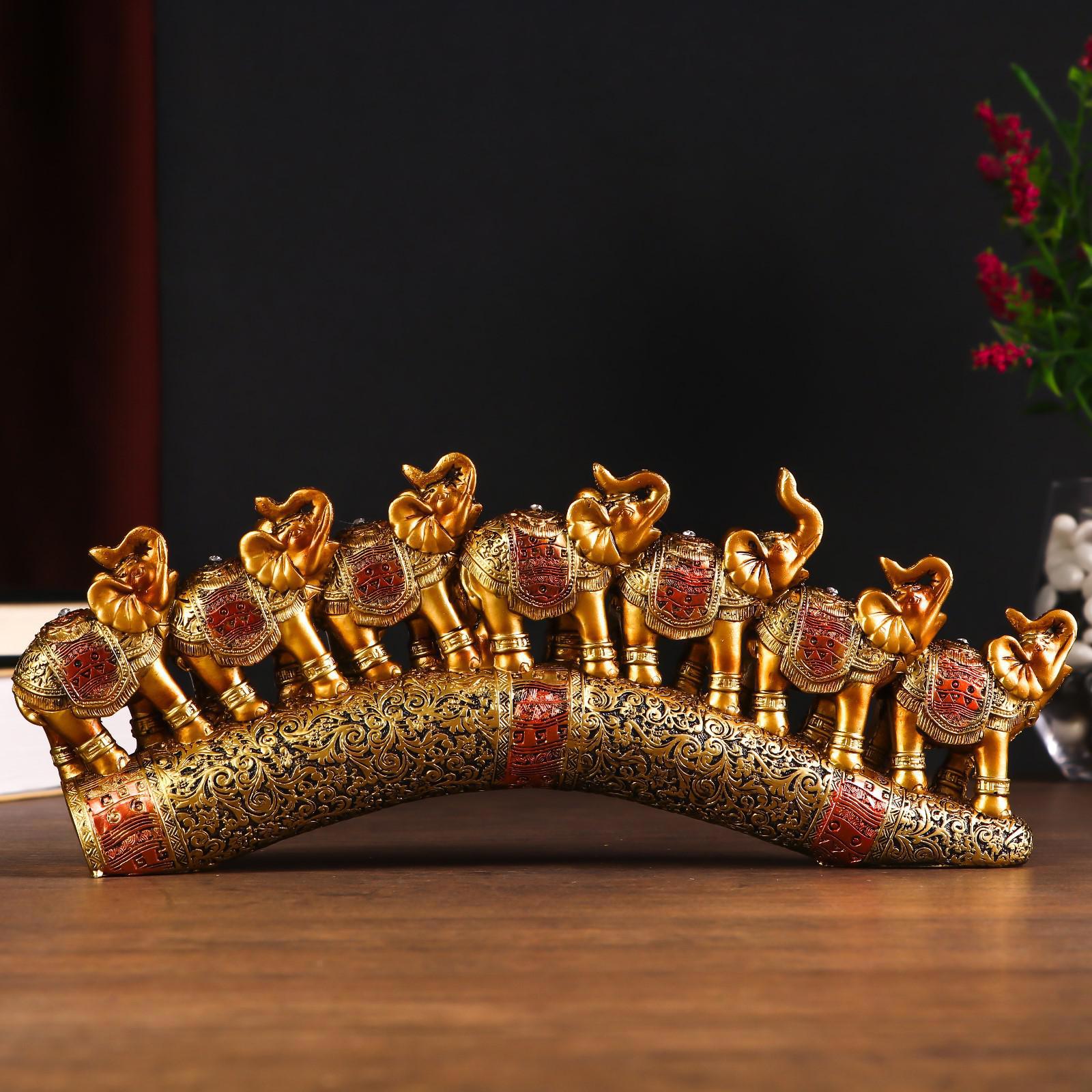 Изображение товара Сувенир интерьерный Семь африканских слонов в золотой, ажурной попоне 10.7x29x4 см