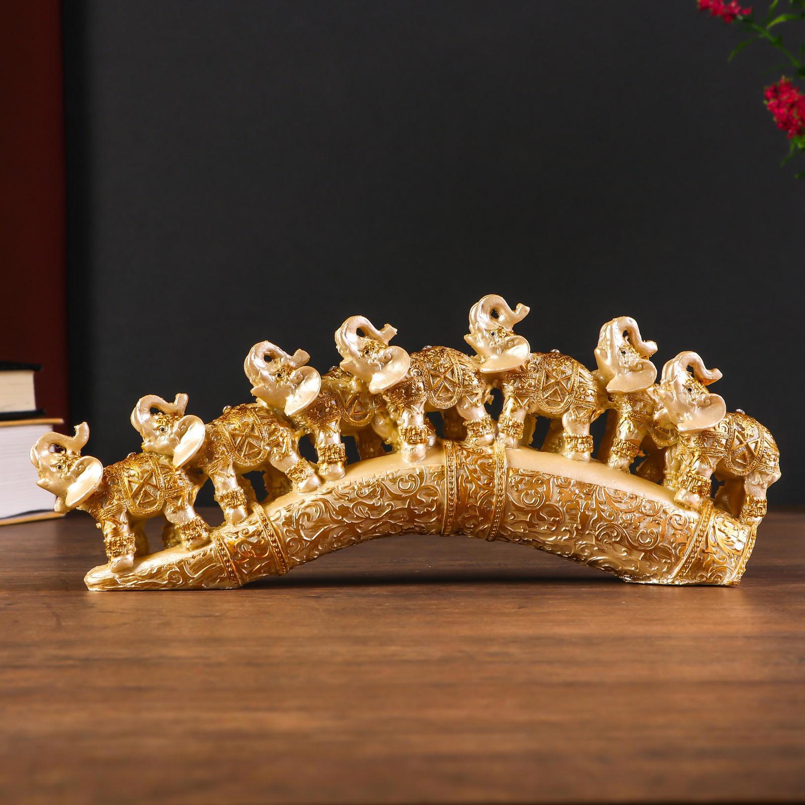 Изображение товара Семь слонов на бивне — резной сувенир из полистоуна 10x24x3,5 см