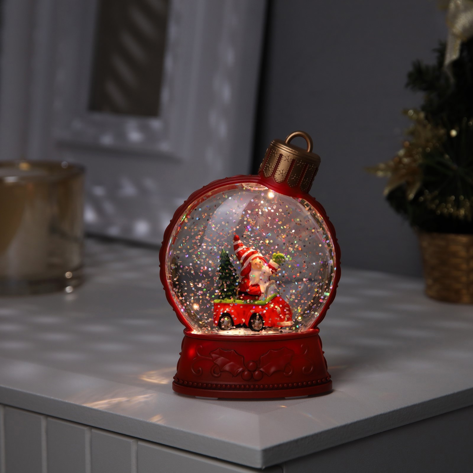 Изображение товара Светящаяся электрическая фигура Гном в машине 4 см разноцветный