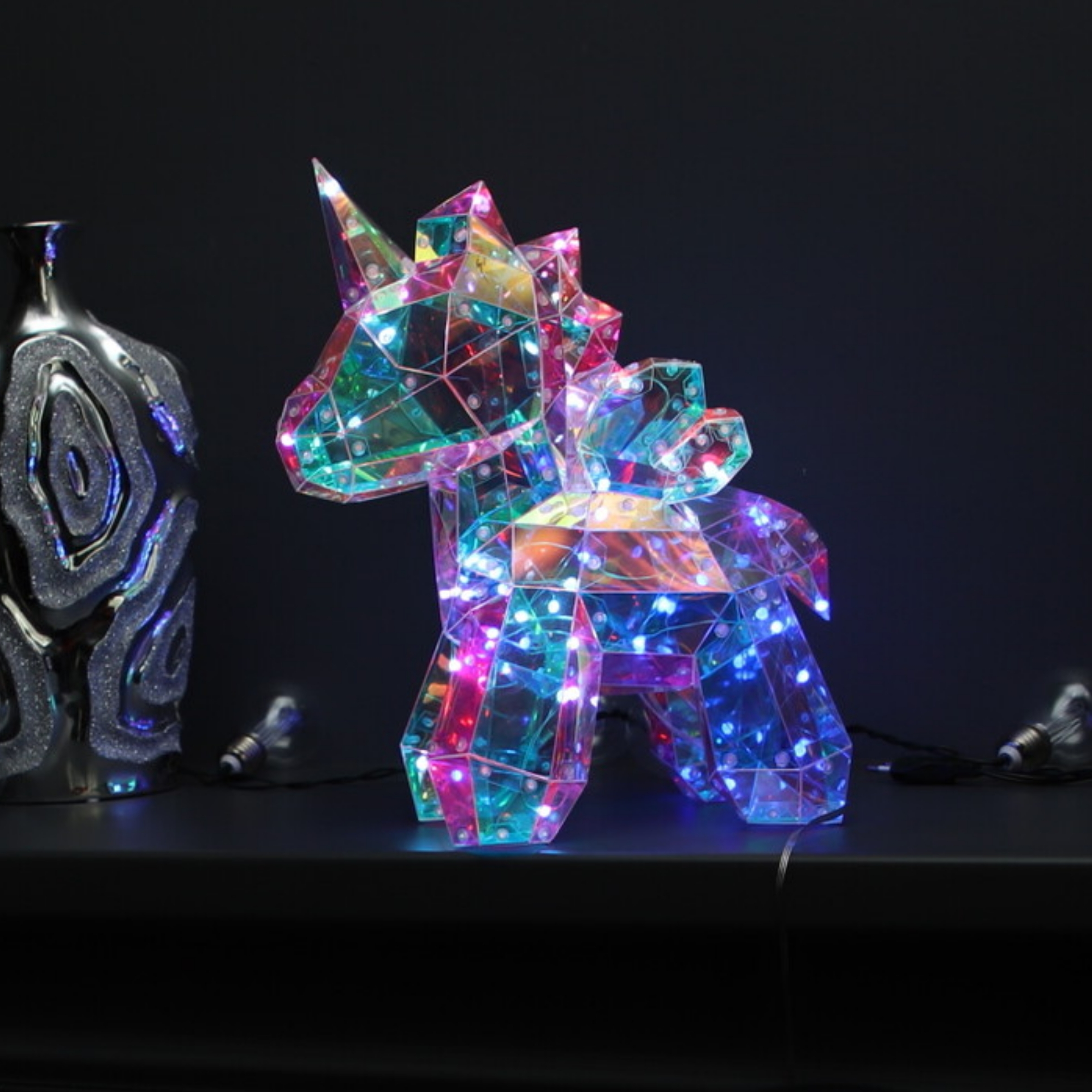 Изображение товара Светящаяся электрическая фигура Uniel Единорог 60 светодиодов 35 см цвет прозрачный