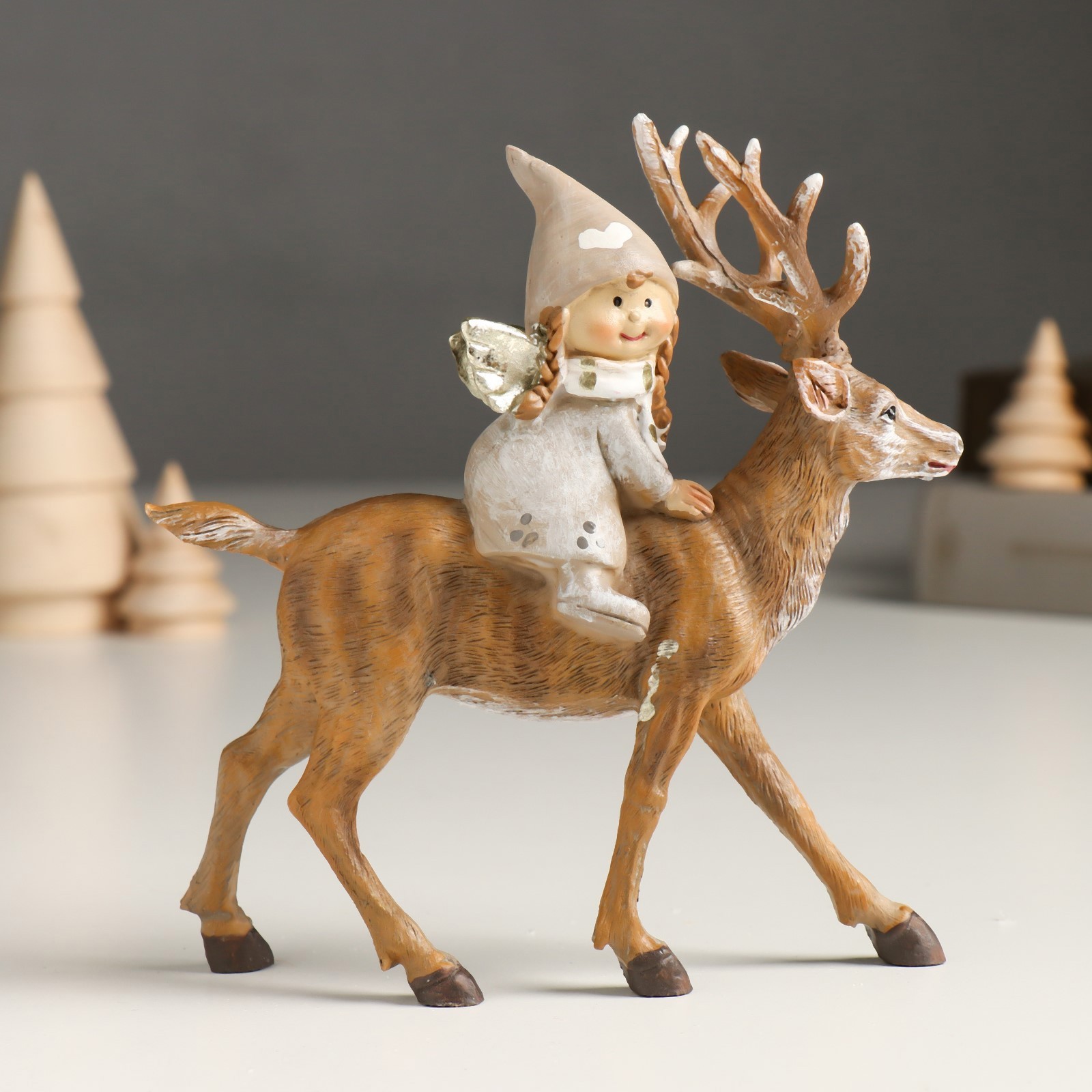 Изображение товара Сувенир "Малышка-ангел в сером наряде, верхом на олене" 5.5x14x14.5 см
