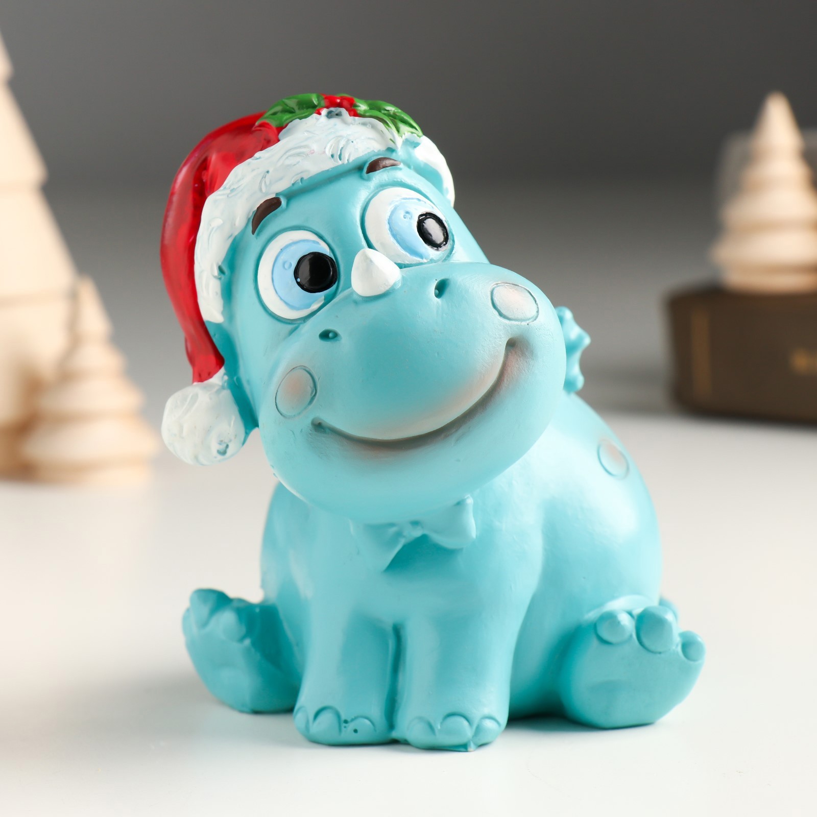 Изображение товара Копилка "Дракоша цвета неба в новогоднем колпаке" 10x8.5x10 см