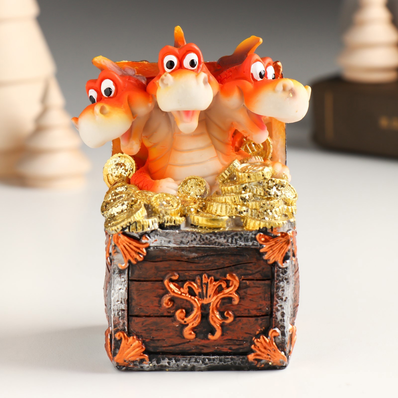 Изображение товара Копилка Трёхголовый дракон в сундуке с золотыми монетами 7.2x6.6x9.8 см Изображение товара Копилка Трёхголовый дракон в сундуке с золотыми монетами 7.2x6.6x9.8 см