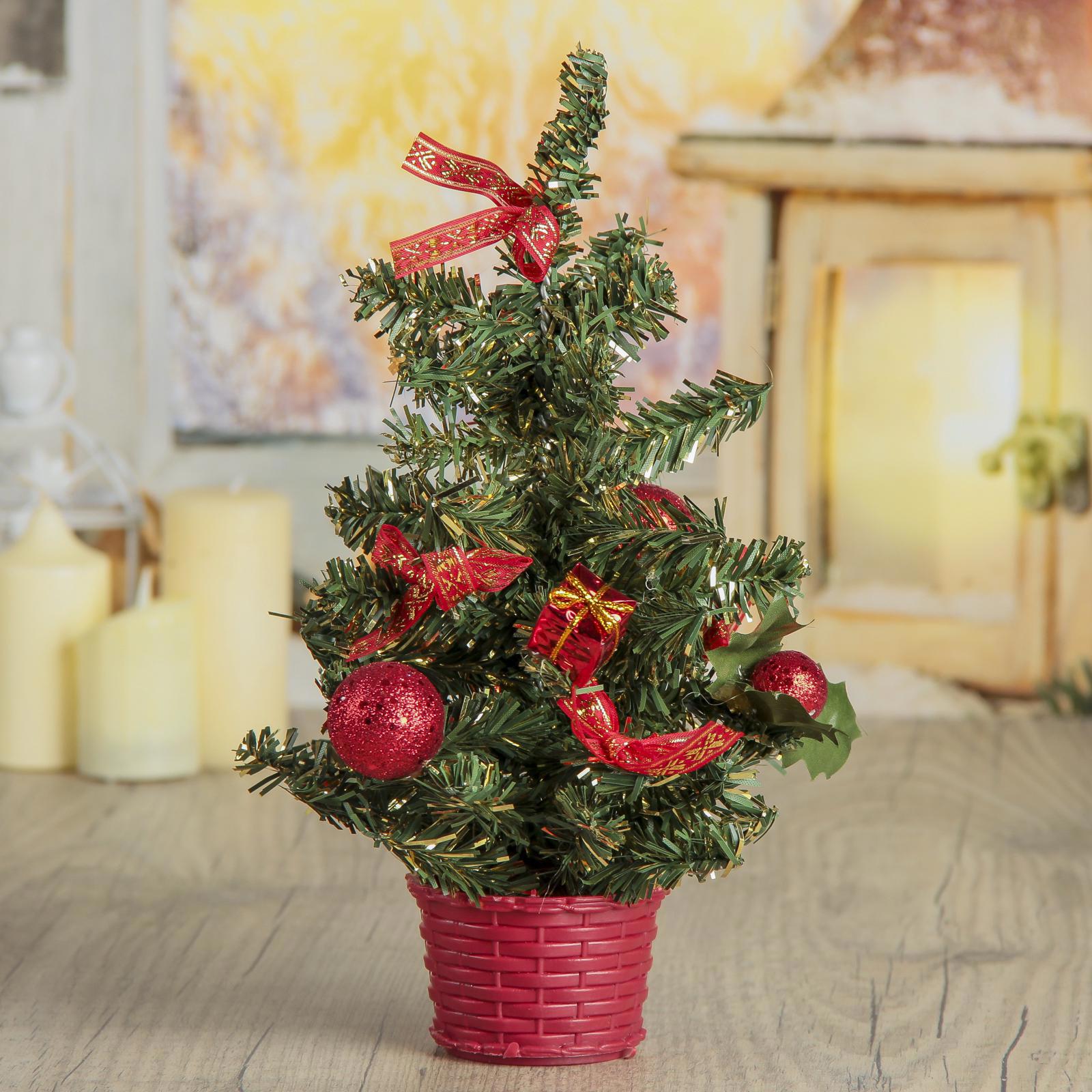 Изображение товара Искусственная новогодняя елка Искринка 25 см с красными шариками и ветками из ПВХ
