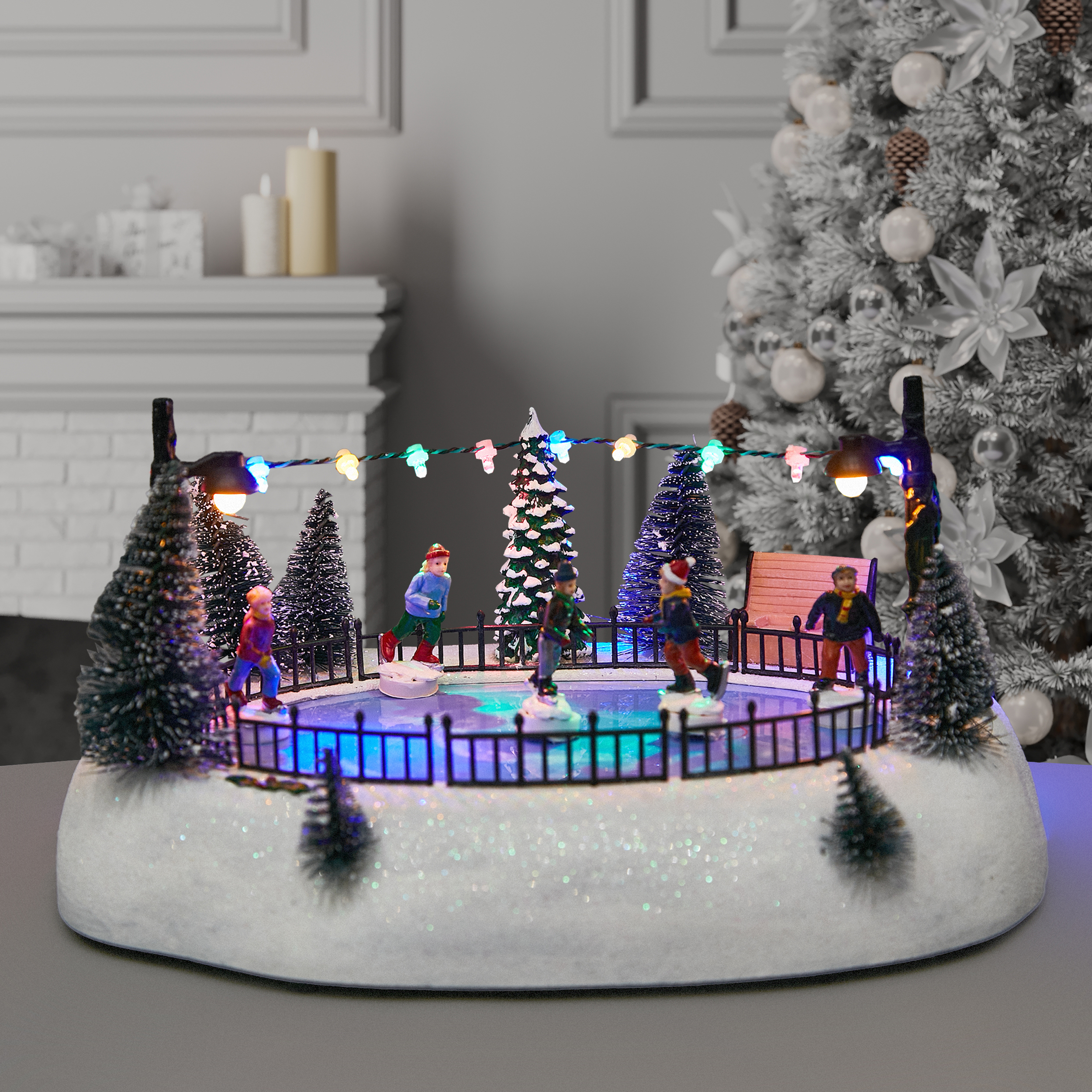 Изображение товара Новогодняя светодиодная композиция Дети на катке 27x20x13 см с музыкой