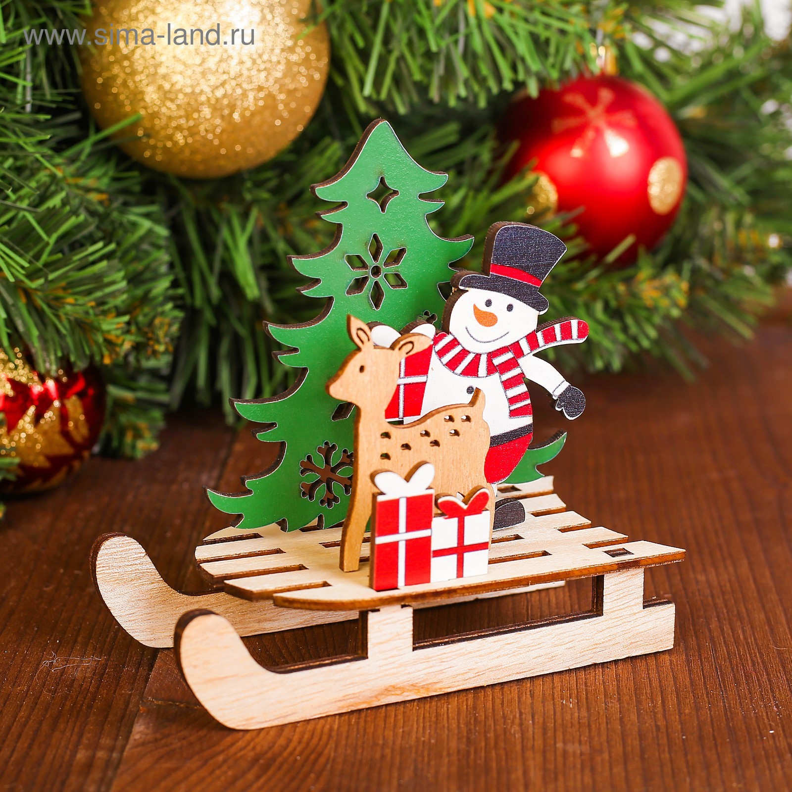 Изображение товара Декор Новогодняя фигурка снеговик с оленем на санях дерево яркий дизайн