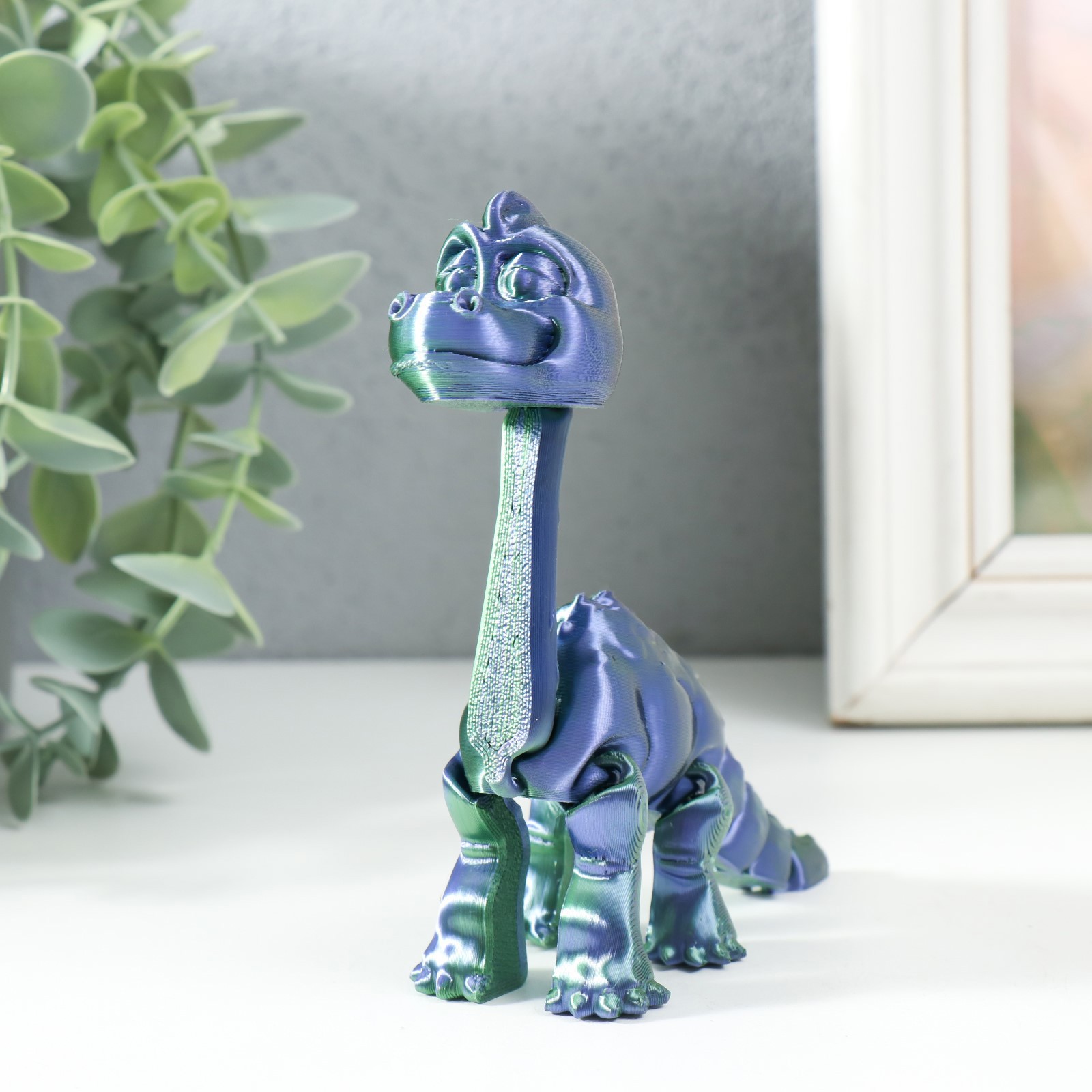 Изображение товара Сувенир-антистресс "Брахиозавр Броня" 8.5x3x18 см зелёный