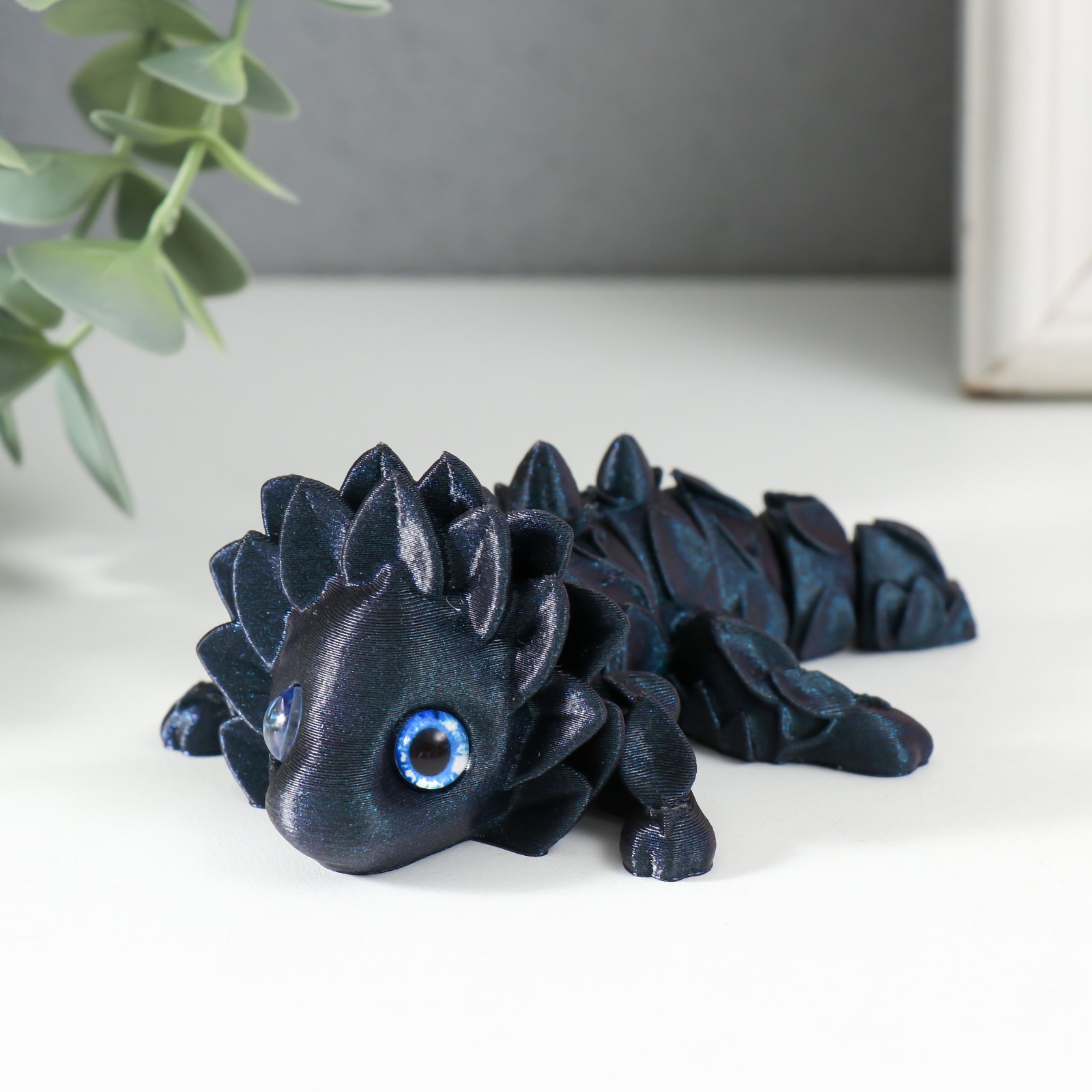 Изображение товара Сувенир-антистресс "Лев Подсолнечник" 11x8x3.8 см тёмно-синий