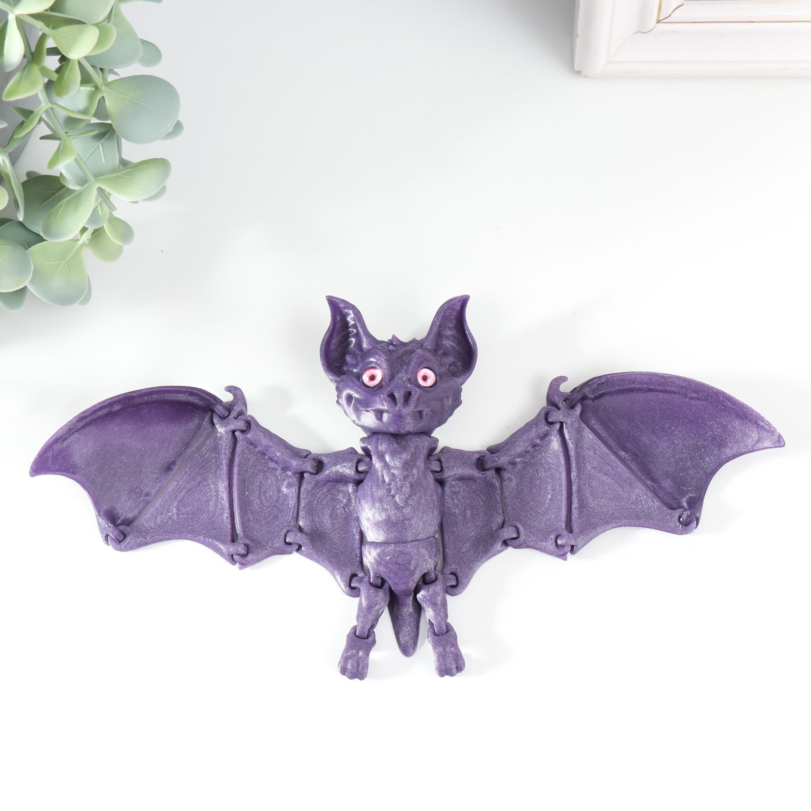 Изображение товара Сувенир-антистресс "Летучая Мышь Бартог" 23.5x11.5x3.8 см фиолетовый